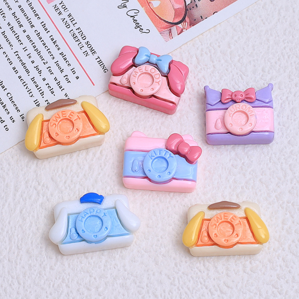 Dibujos animados pequeña cámara transmisión en vivo caliente DIY pegamento crema teléfono móvil Shell joyería accesorios de resina horquilla al por mayor