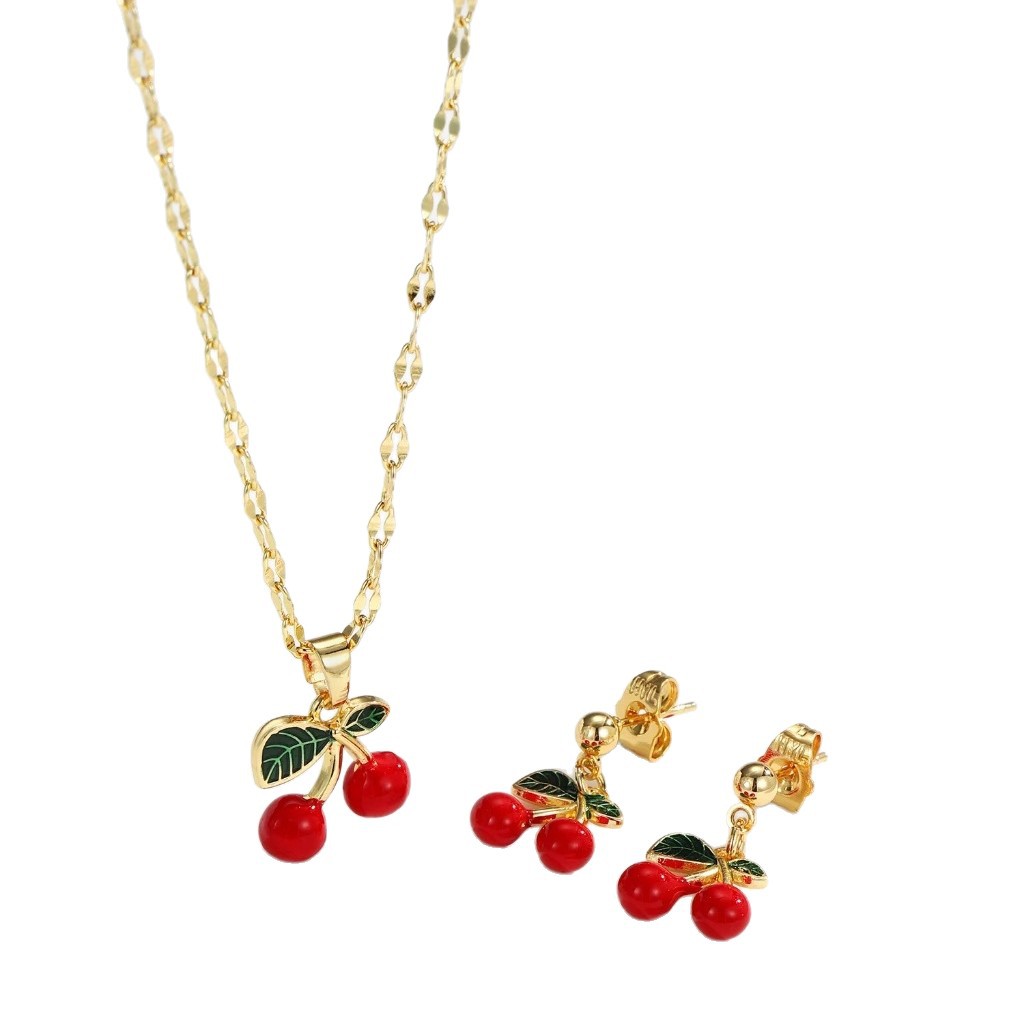 Explosiones transfronterizas coloridas cereza roja pintada a mano goteo de frutas series de joyería simple colgante de viento conjunto de aretes collar