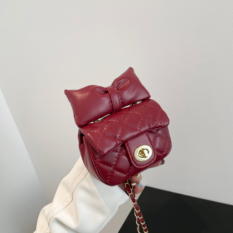 Bolsa de textura 2025 nueva moda extranjera cadena mochila primavera y verano nicho dulce arco mini bolso