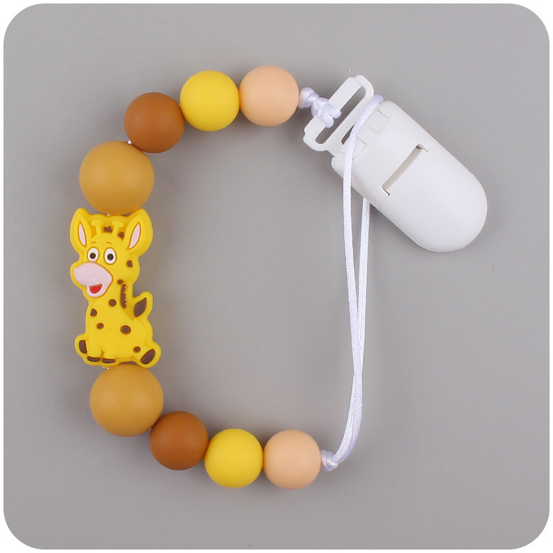 Nuevo bebé suministros chupete cadena creativa de dibujos animados jirafa silicona bebé mordedura cadena anti-caída molar