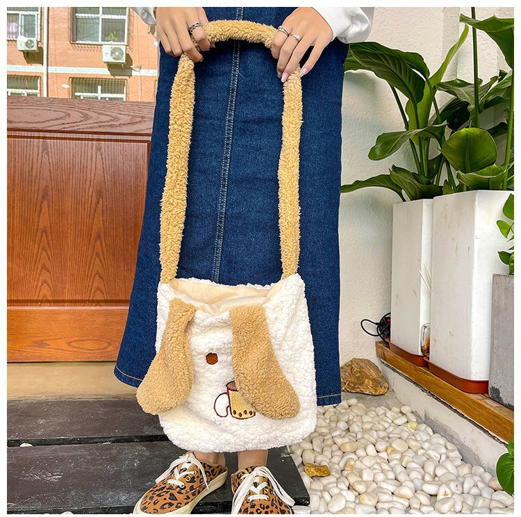 This autumn and winter hand-held bag with big ears, cute animal-embroidered fur, and a simple lambskin large-capacity student backpack undefined