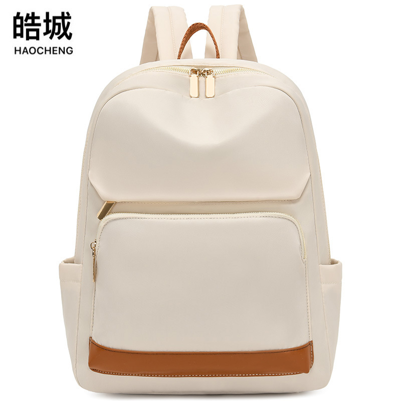 Mochila para computadora de 14 pulgadas para mujer 2024 nueva mochila casual para mujer moda color de contraste mochila escolar para estudiantes de secundaria al por mayor