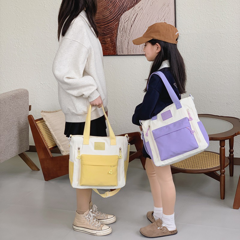 Bolsas de hombro coreanas para niños y niñas de color contraste, bolsas de escuela primaria de gran capacidad 2026 para padres e hijos, bolsas de moda