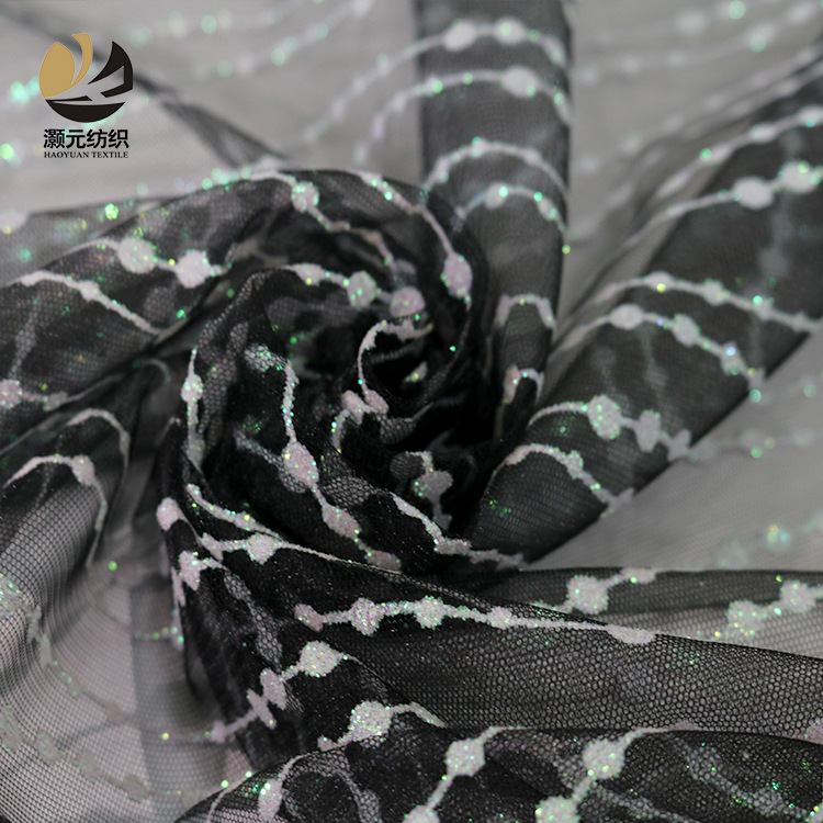 Fabricantes de venta de bajo precio ondulado fantasía polvo brillante tela de malla vestido de noche tela de boda