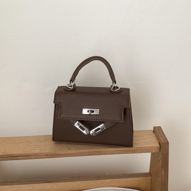Bolso de mano de alta sensación para mujeres 2026 nuevo retro lichi Kelly bolso nicho lujoso mochila de hombro image 16