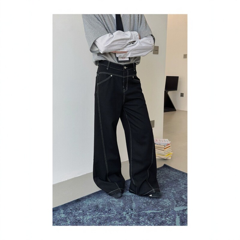 American-style deconstructed stitching curved hem jeans for men, autumn American high street vibe pants, loose wide-leg flared trousers