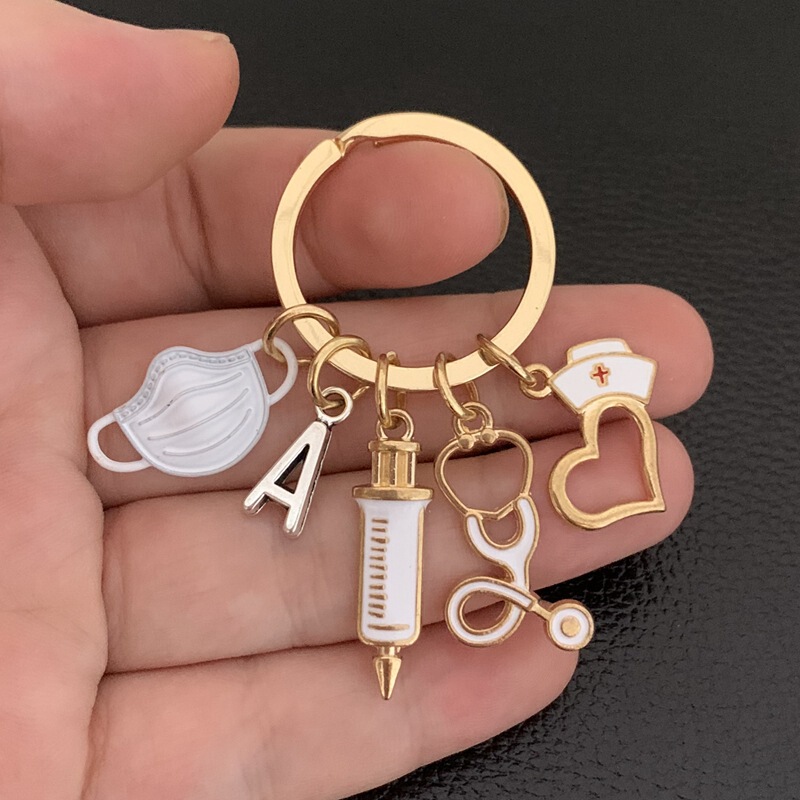 26 letters European and American fashion new Doctor Nurse key ring syringe stethoscope mask car key chain 26 letters European and American fashion new Doctor Nurse key ring syringe stethoscope mask car key chain
