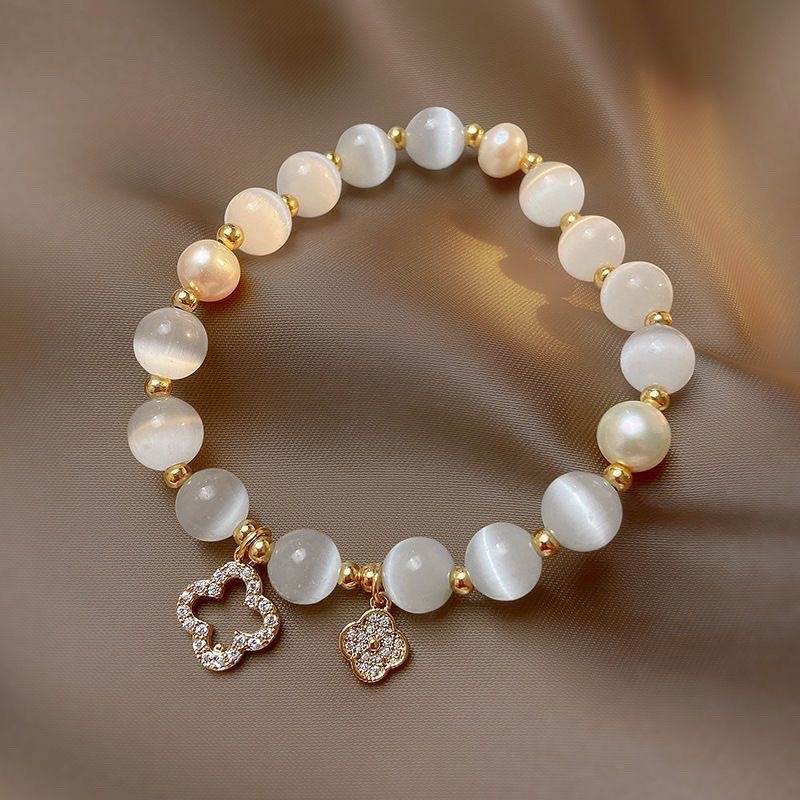 2025 nuevo ojo de gato piedra de cuatro hojas pulsera de vidrio pulsera de perlas de nicho