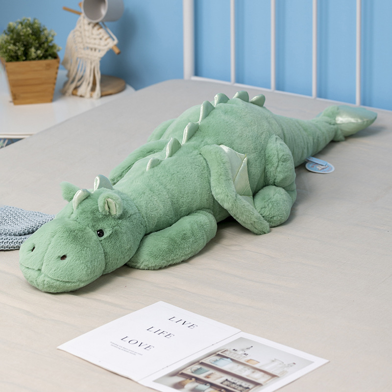 Nuevo estilo acostado pequeño Dragón Volador de peluche de juguete cama puede clip piernas dormir dinosaurio muñeca suave muñeca Linda regalo de los niños