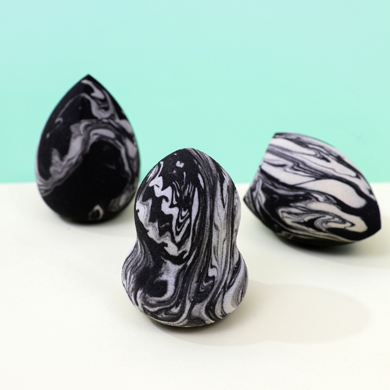 Personalizado de fábrica, mezcla de colores transfronterizos, maquillaje en forma de gota, soplo de polvo de huevo, no coma polvo, se agranda con el agua, esponja de maquillaje sin látex