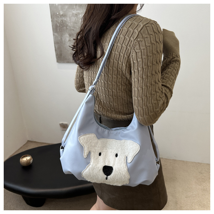 The new autumn and winter 2024 fashion cartoon backpack with simple, individual and niche design, single-shoulder bag and commuter tote bag undefined