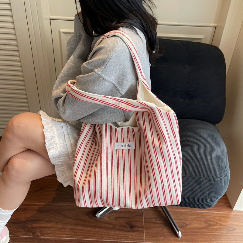 Bolso Tote de moda coreana 2025 nuevo bolso de lona estilo azul marino a rayas bolso de hombro con letras casuales