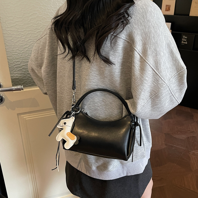 Meilade viento suave cuero brazo bolso para mujeres 2026 nuevo estilo de moda de viaje bolso de hombro sensación diaria simple mochila