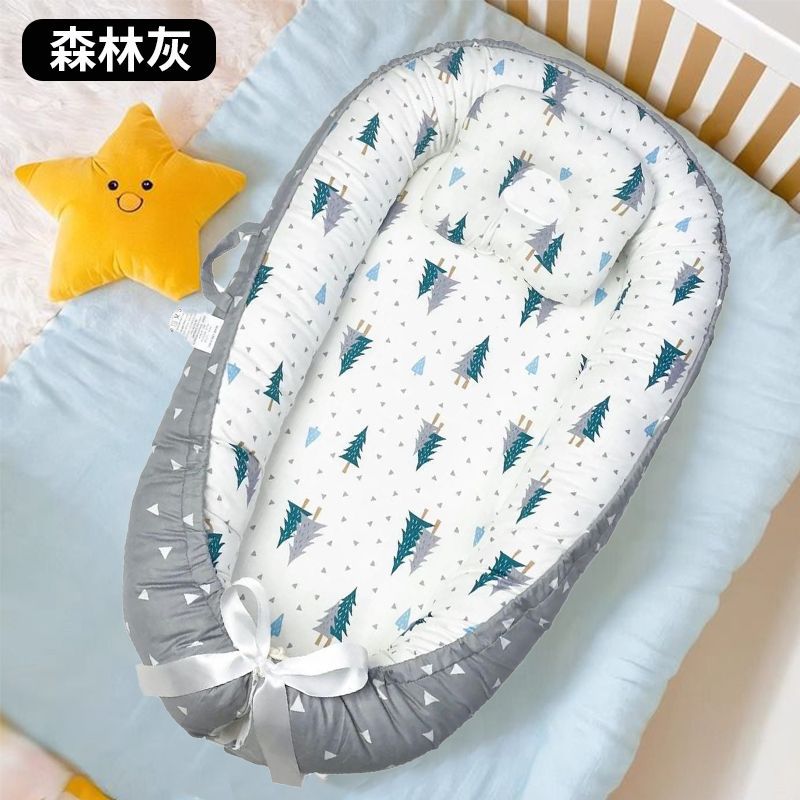 Cama de bebé portátil desmontable transfronteriza en la cama media para recién nacidos acostados para dormir