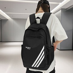 新型中学高校の学生のカバン韓国版の個性的なファッションのアルファベットのカップルのリュックサックの大容量の旅行のリュックサック