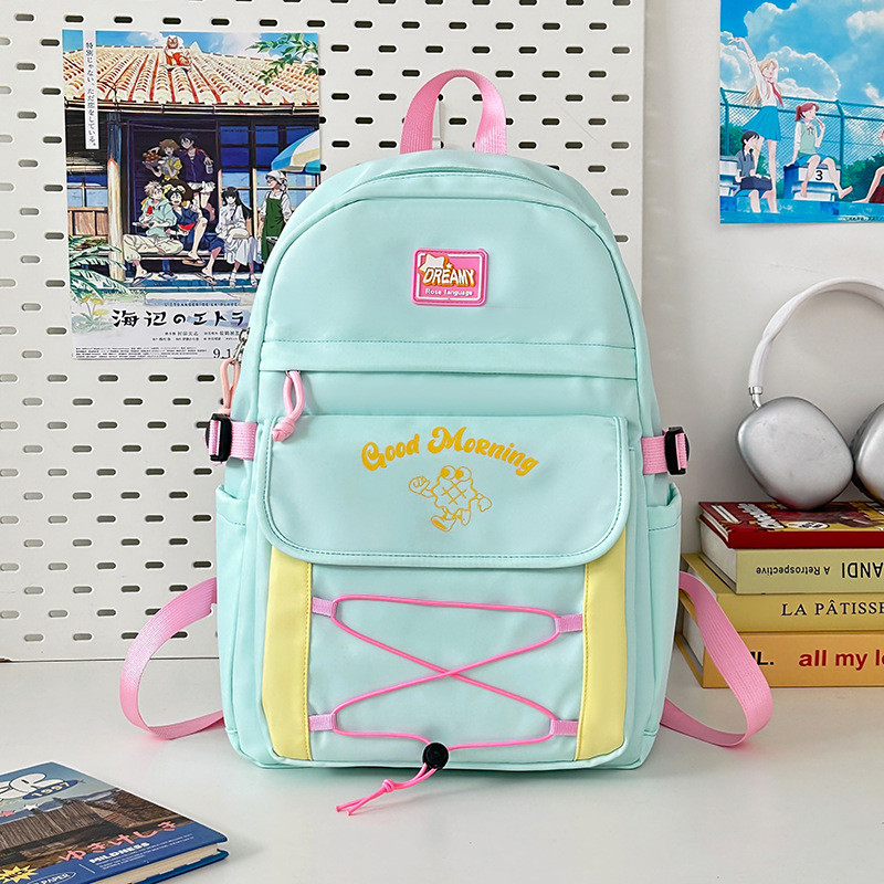 Mochila de estilo universitario de color de contraste lindo mujer 2025 nueva mochila de estilo crema casual campus escuela secundaria escuela secundaria