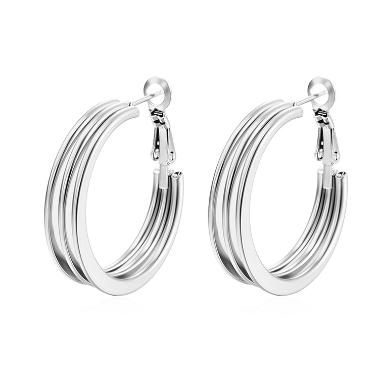INS Europa y América de moda redonda multicapa de aretes inoxidables planos de estilo retrógrado de moda galvanizado 18K aretes