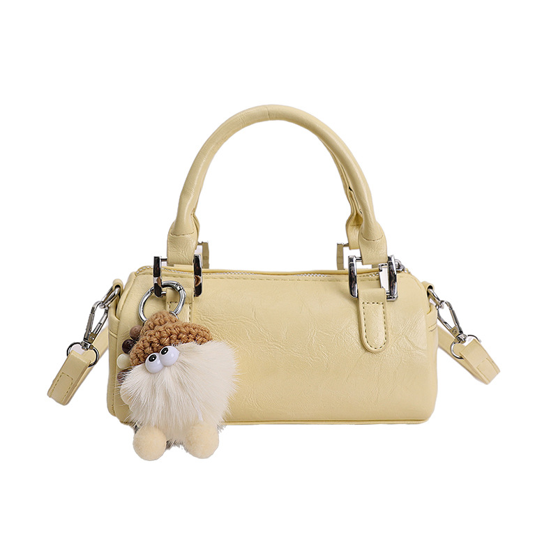 Nicho de diseño retro bolso de mano mujer 2026 primavera nuevo bolso de hombro sensación diaria de moda oblicuo bolso cilíndrico
