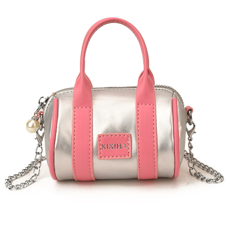Bolsa de almohada cilíndrica de moda de contraste para niños y niñas bolsas de cadena mini lindas para bebés 2026 nuevas bolsas de accesorios para niños