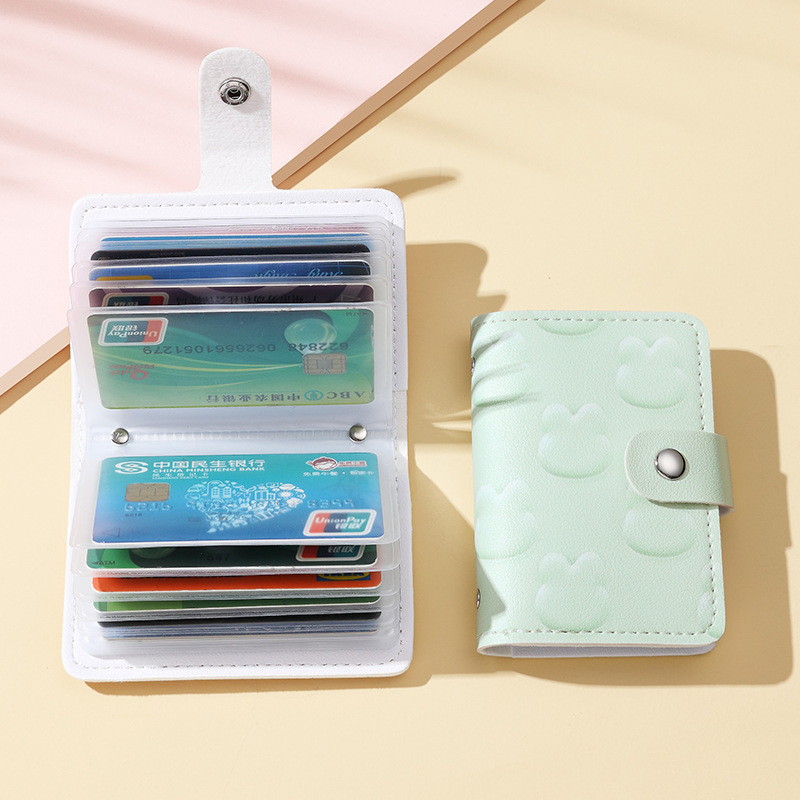 Coreano multifuncional pequeño dibujo animado fresco en relieve conejo 20 tarjeta anti-damagnetizante hebilla vertical bolsa de tarjetas