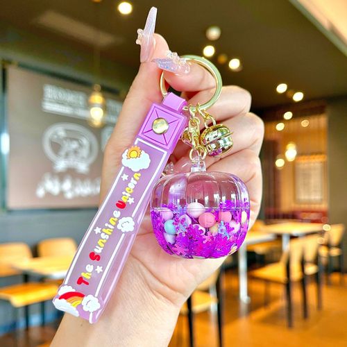 Oil-infused luminous pumpkin quicksand bottle key chain car pendant cartoon creative doll machine grab machine school bag gift pendant