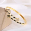 【147】Black four-leaf flower arrangement in golden color