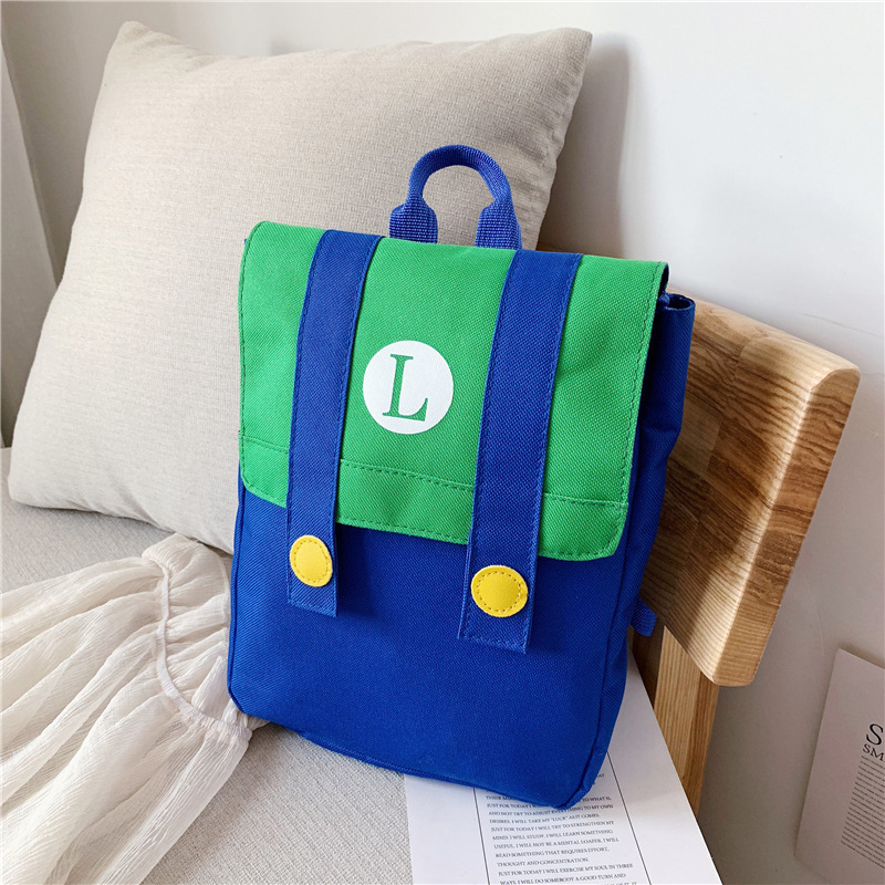 Nueva mochila infantil de estilo coreano con letras de dibujos animados impresas con LOGO, mochila para niños y niñas, mochila escolar de colores contrastantes para jardín de infantes