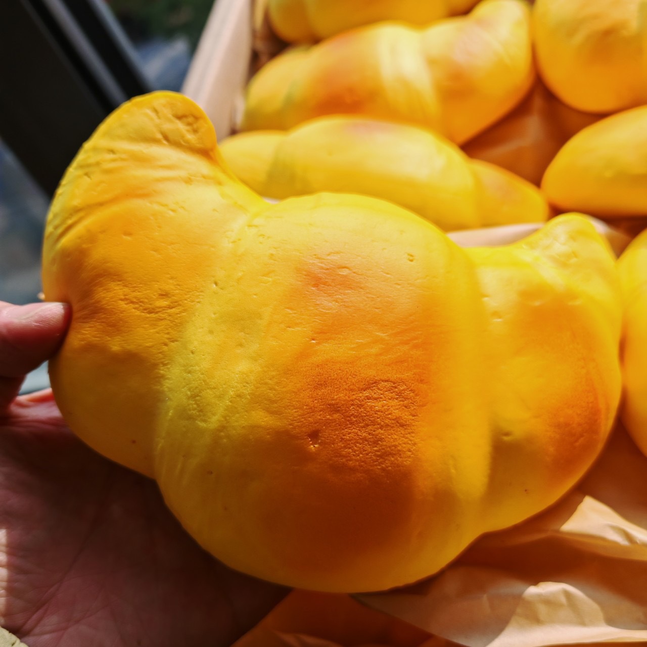 Simulación de alimentos húmedos suaves rebote lento bolsas de piña super grandes pellizco juguetes pellizco bolsas de cuerno de toro juguetes de descompresión de pan
