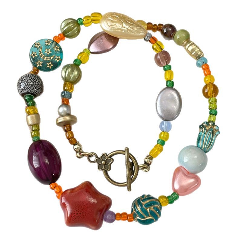 Collar de estrella con cuentas de esmalte de colores Cadena de clavícula Mujer Retro nicho 2025 Nuevo diseño personalizado Sense Collar