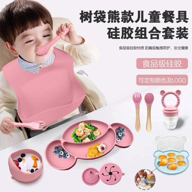 Nuevos productos transfronterizos para niños suplementarios de silicona platos de comedor cuchara de tenedor baudero ocho piezas conjuntos a prueba de caídas mangar suministros para madre y bebé