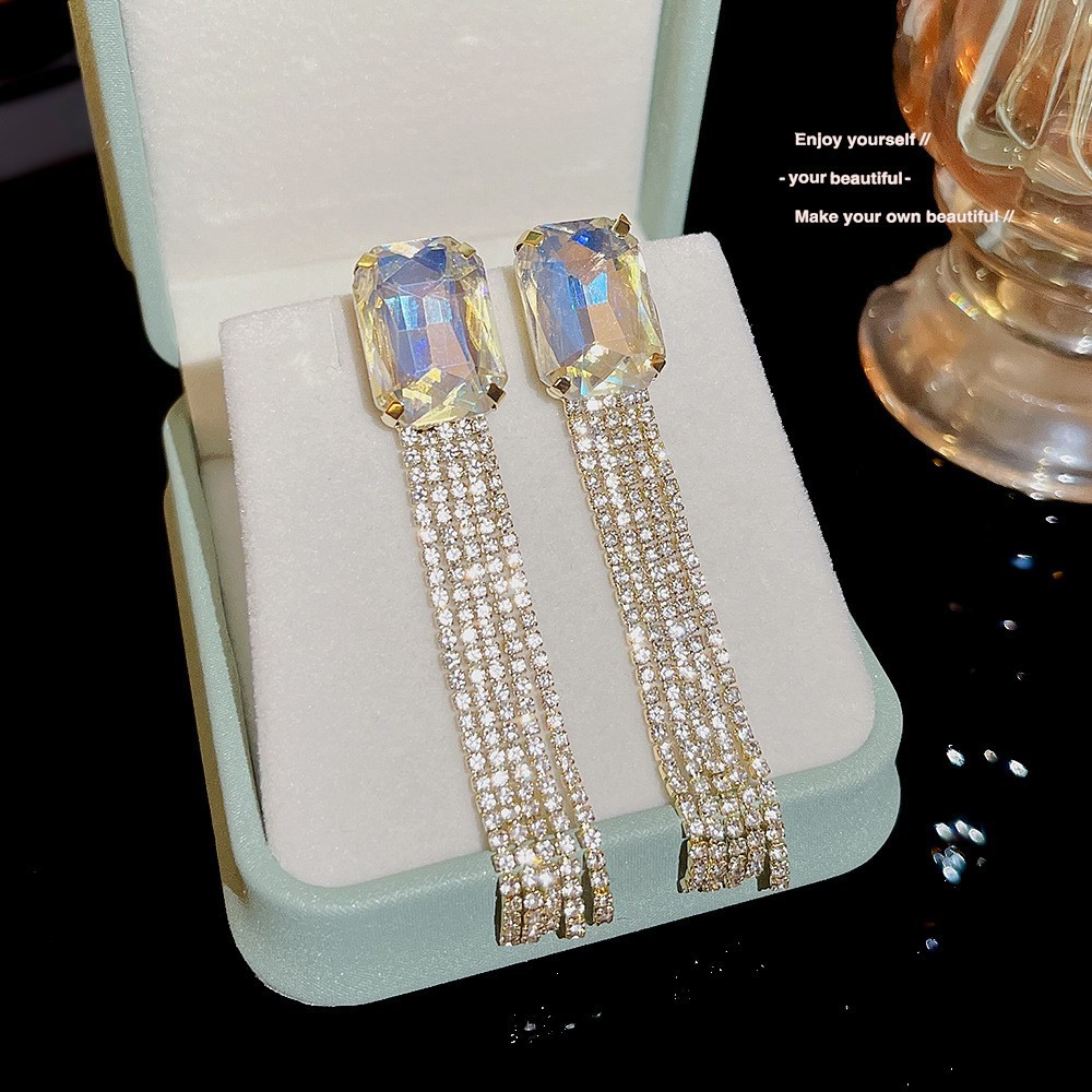 S925 aguja de plata elegante borla pendientes de alta gama simple cara de adelgazamiento pendientes de todo fósforo estilo coreano nuevos pendientes de moda al por mayor