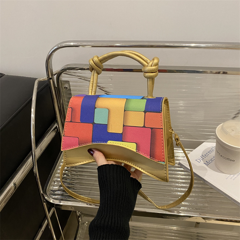 2024 invierno nuevo estilo coreano macarón bolso de hombro color de choque bolso de mano de textura casual bolso de mujer