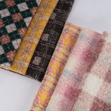 厂家现货羊羔毛 圈圈呢 格子 服装箱包面料
