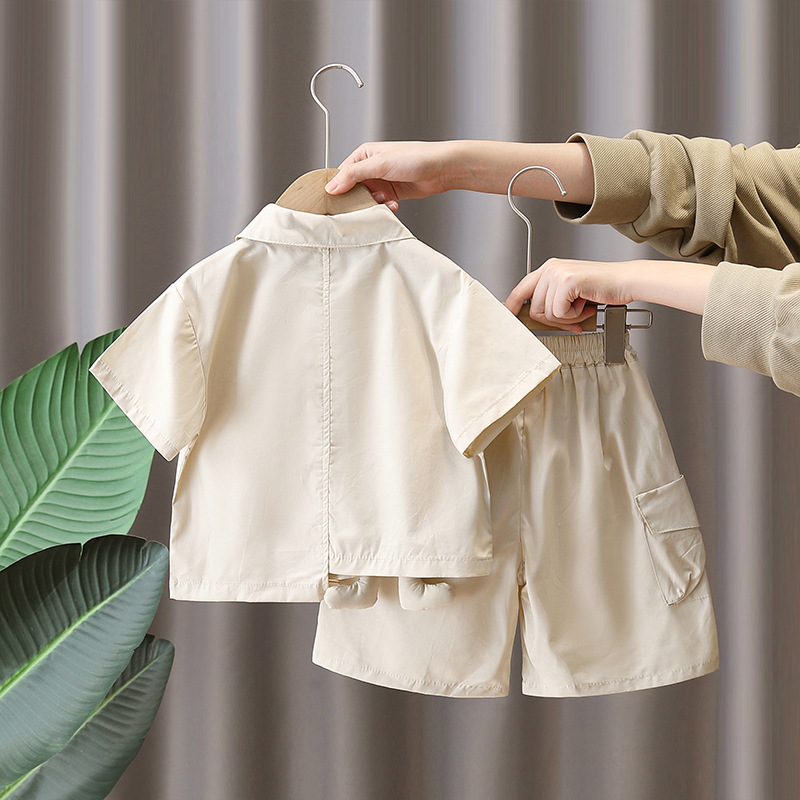 7286 traje de verano para niños 2025 nueva camisa de oso de dibujos animados para niños pantalones cortos de manga corta de verano de dos piezas de verano