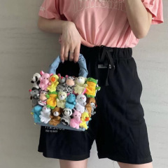 ライブ漫画バッグニッチデニムかわいいスタイル人形ハンドヘルドクロスボディレディースバッグ 2023 新しい小さなバッグトレンド
