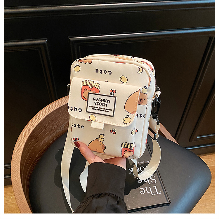 Cartoon animal print, many pockets, few bags, single-shoulder bag for girls, large capacity, cute graffiti, lightweight schoolbag for primary and middle school students undefined
