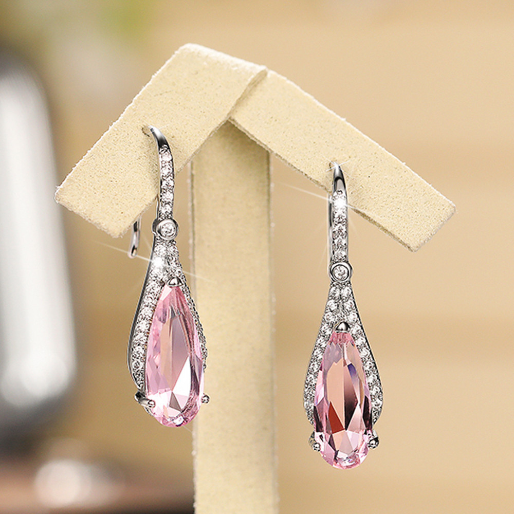 Fashionable elegant long earrings drop-shaped