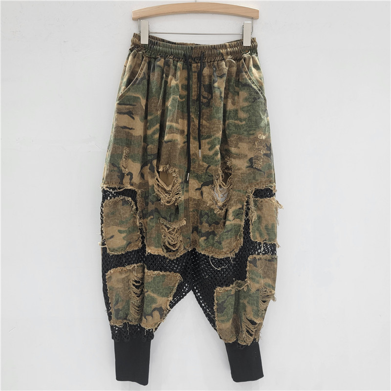 Personalidad nicho moda mujer 2025 verano nuevo estilo malla hueca costura nueve puntos camuflaje pantalones de entrepierna