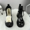 Black glossy leather and wool lining