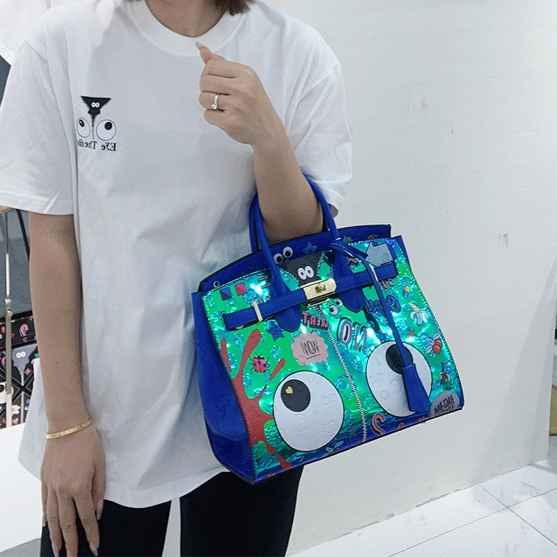 2025 verano fantasía de color metal material especial impresión insignia personalidad bolso de mujer bolso de mano 2486 #