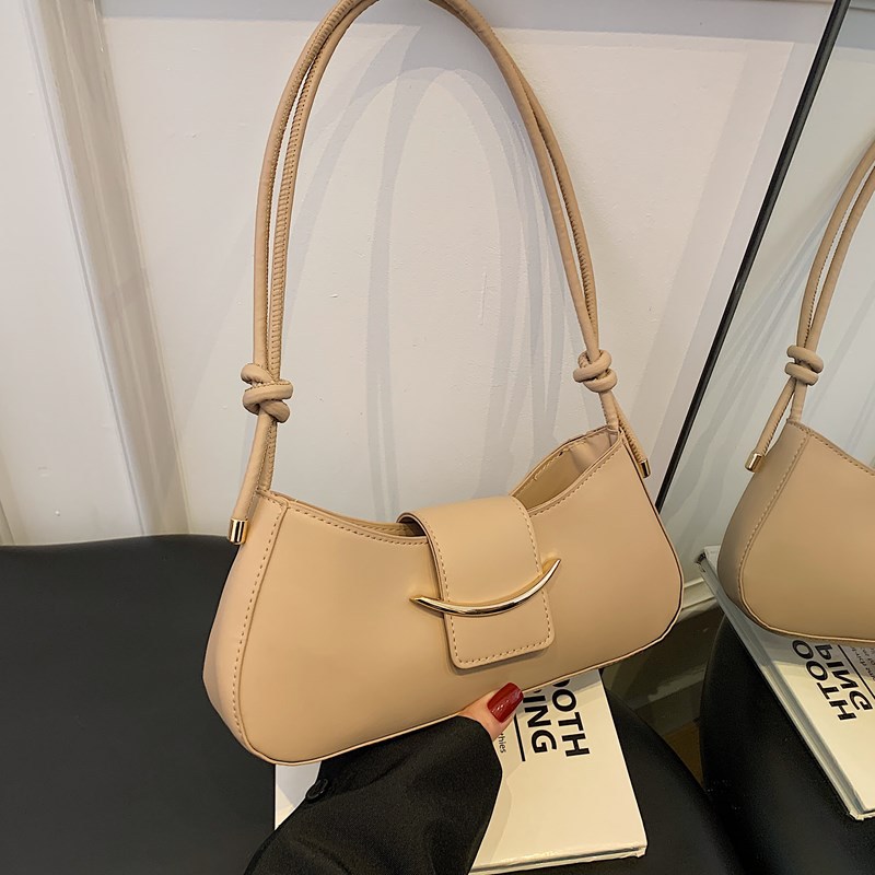 Bolso de axila de un solo hombro de estilo popular de nicho de alta gama para mujer 2025 primavera y verano nuevo bolso bandolera salvaje de moda