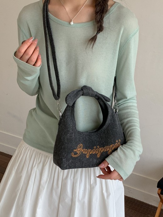 Bolso para mujeres 2026 nuevo estilo coreano bordado letras de brazalete bolso de tela alta textura denim mochila casual