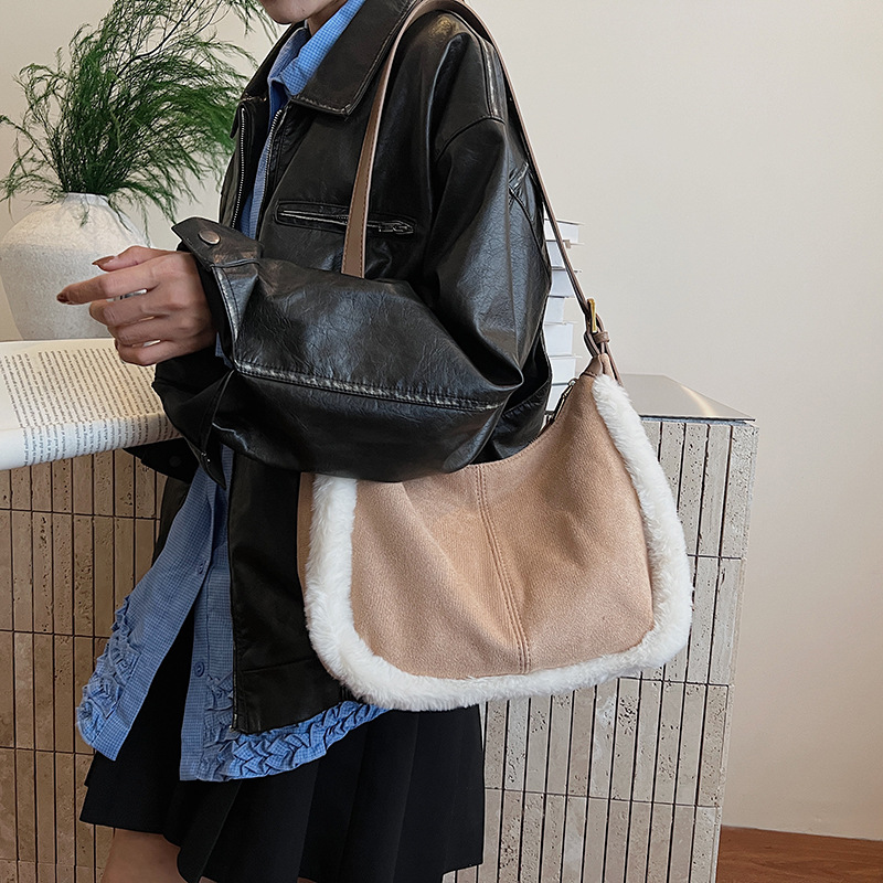 2025 otoño y invierno nuevo estilo retro de cuero de seda bolso de peludo de mujer bolso de cubo de peludo bolso de hombro de color de colisión bolso de mochila versátil