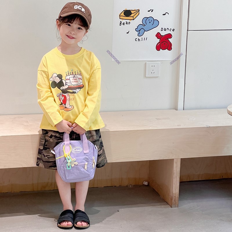 Nuevo comercio exterior bolso para niños, mini bolso simple de color sólido para bebés, bolso de cambio para viajes al aire libre para hombres y mujeres
