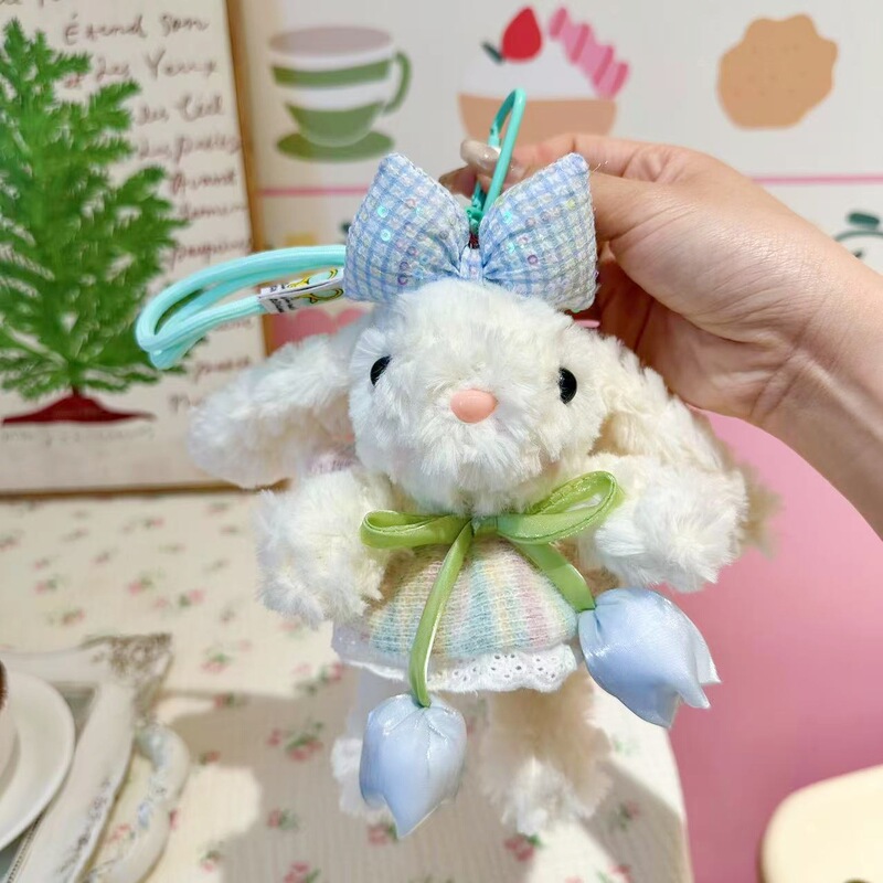 新商品の桜の耳を垂れたウサギのカバンのペンダントのぬいぐるみのキーホルダーはクリスマスプレゼントを飾ります。|undefined