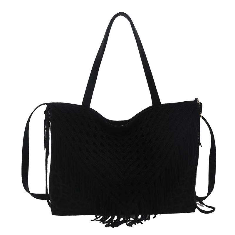 2025 nuevo bolso de bordilla retro bolso de mujer agujero bolso de tejido a mano bolso de playa bolso de hombro de la señora Sen Meng