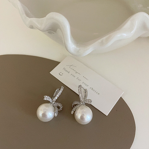 Design retro universal elegant earrings with zircon with bow from…