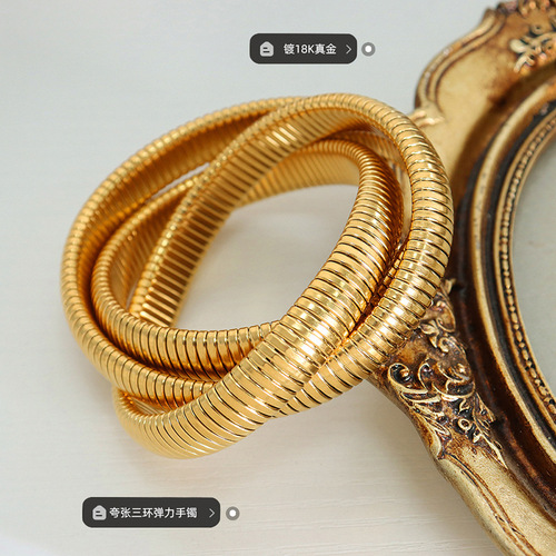 Cross-border hot-selling European and American light luxury fashion gold-plated three-layer bracelet stainless steel snake-shaped three-ring winding elastic bracelet