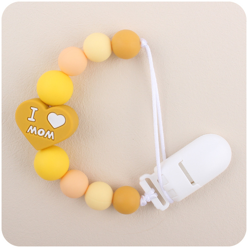 Bebé de dibujos animados amor dos lados mamá papá silicona mordedor calmante bebé chupete cadena a prueba de mordedura