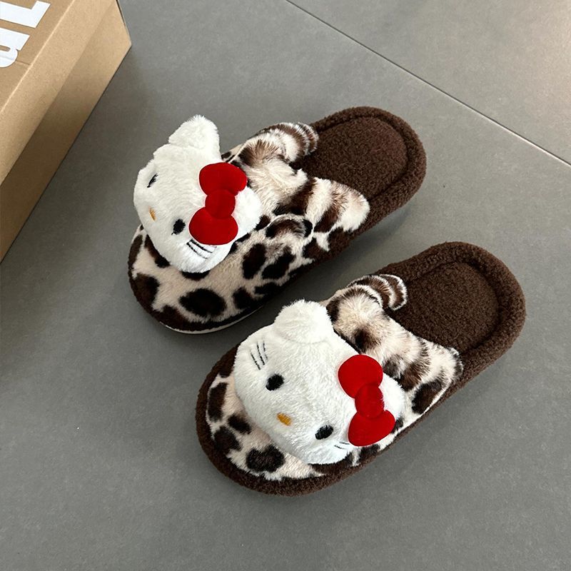 Hello Kitty zapatillas estampadas de leopardo interior de peluche de peluche de invierno anti-deslizante calentamiento al por mayor zapatillas de algodón lindas